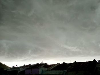 Low angle view of houses against sky