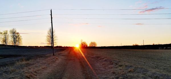 Road against sky during sunset