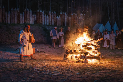 Group of people at bonfire