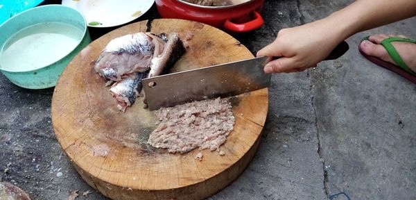 High angle view of person preparing food on table