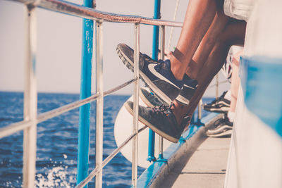 Man holding boat sailing in sea