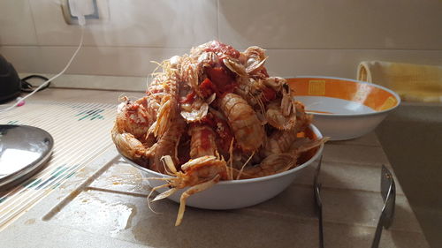 High angle view of prawns in bowl on table