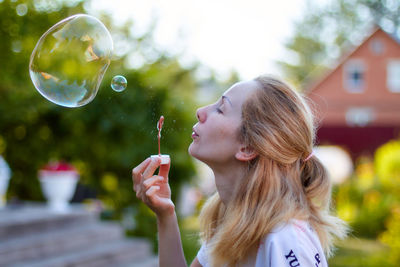 Young woman in bubbles