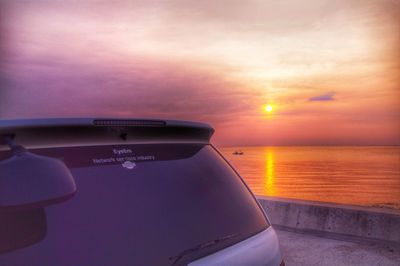 Scenic view of sea at sunset