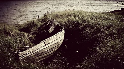 Boat moored on river