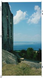 Scenic view of sea against cloudy sky