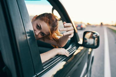 Portrait of woman in car