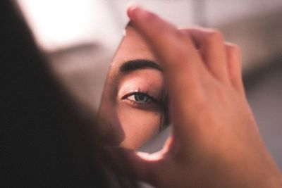 Cropped image of woman holding hair