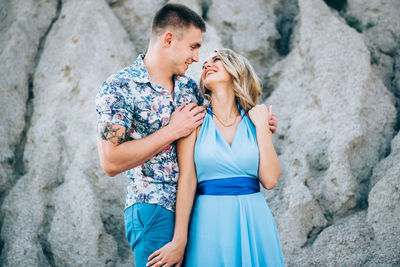 Young couple standing outdoors