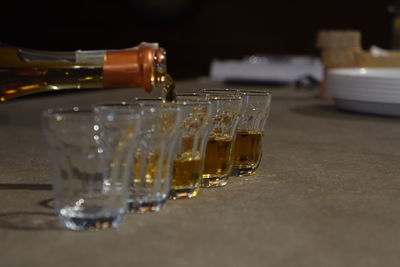 Close-up of beer glass on table