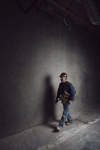 Worker walking on construction site