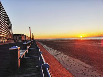 Scenic view of sea against clear sky during sunset