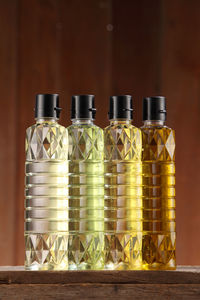 Close-up of liquid in bottles on table