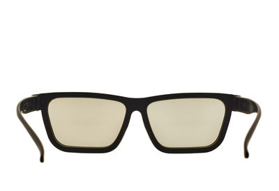 Close-up of sunglasses against white background