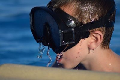 Close-up of mid adult man in the sea
