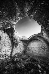 Low angle view of old ruin tunnel