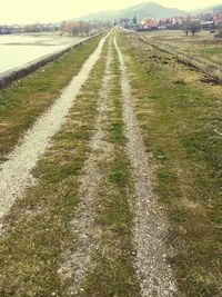 Road passing through field