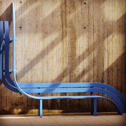 Empty wooden chairs against blue sky