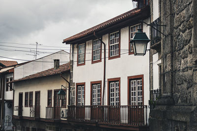 Low angle view of residential buildings against sky