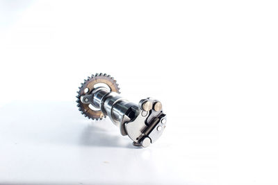 High angle view of machine part on white background