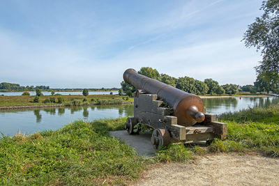 Old cannon gun at the walls from the fortified city woudrichem  in the netherlands