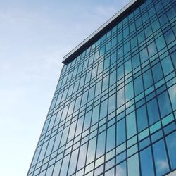 Low angle view of skyscraper against clear sky