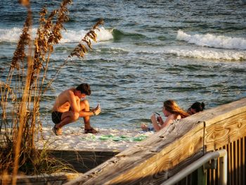 People enjoying at beach