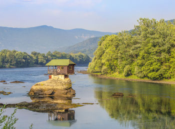 Small house on a stone on drina river, near the bajina basta in serbia