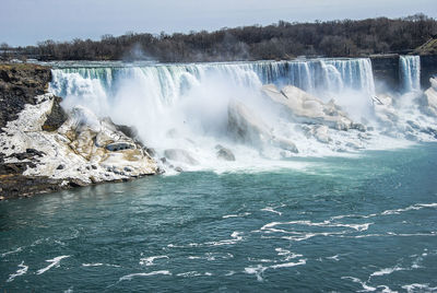 View of waterfall against sky