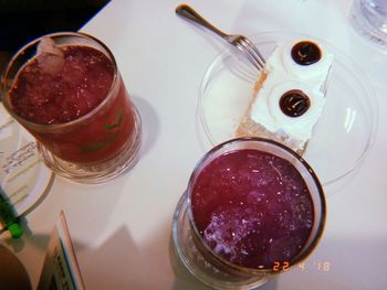 High angle view of drink in glass on table