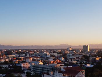 High angle view of townscape against sky during sunset