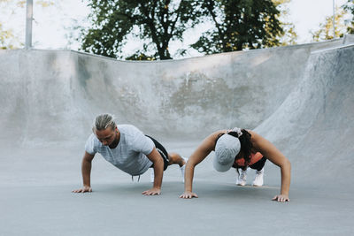 Couple doing push-ups together