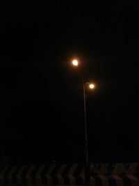 Low angle view of illuminated street light