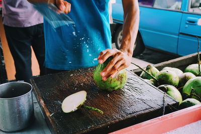 Midsection of woman preparing food