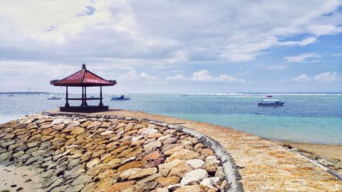 Scenic view of calm sea against sky