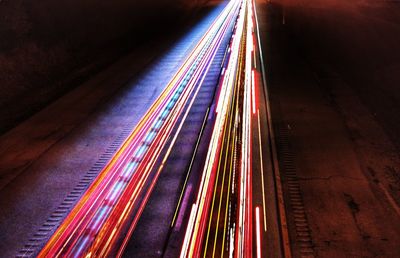 High angle view of light trails on road