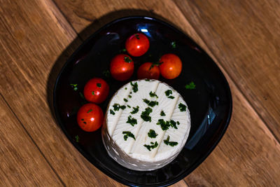 High angle view of tomatoes in bowl on table