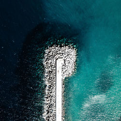 Aerial view of pier in sea