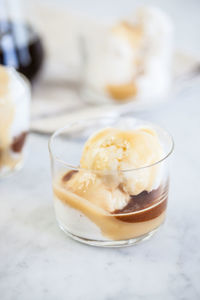 Close-up of ice cream in glass on table