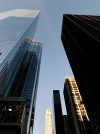 Low angle view of modern buildings against sky