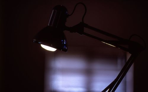 Close-up of illuminated electric lamp