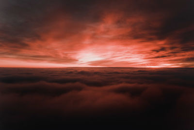 Low angle view of dramatic sky during sunset