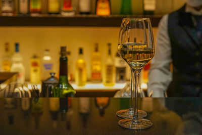 Close-up of wineglass on table