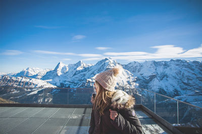 Scenic view of snow covered mountains