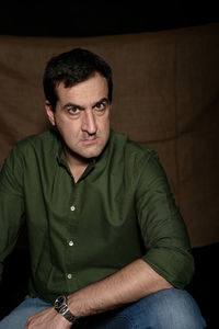 Portrait of man sitting outdoors