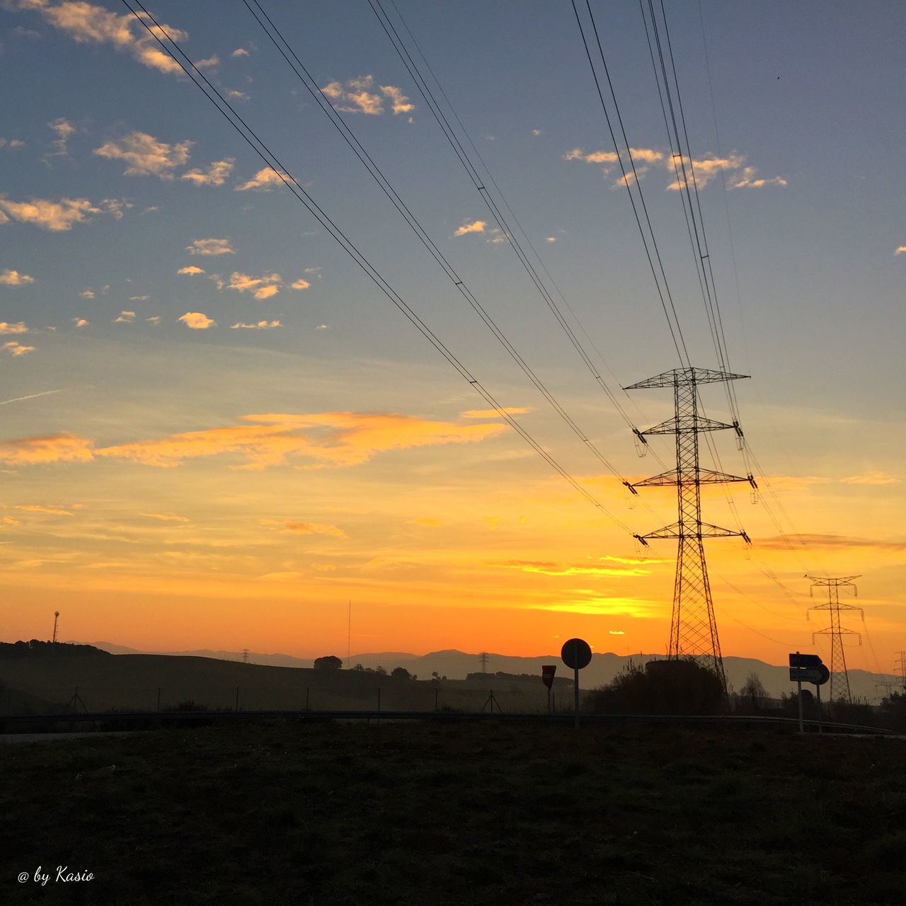 sunset, sky, electricity pylon, landscape, tranquility, scenics, power line, tranquil scene, orange color, field, beauty in nature, silhouette, fuel and power generation, nature, electricity, power supply, idyllic, cloud, cloud - sky, technology