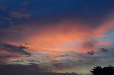 Low angle view of dramatic sky during sunset