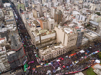 High angle view of crowd and cityscape