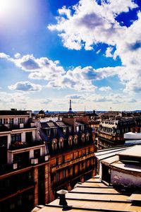 View of bridge in city against sky