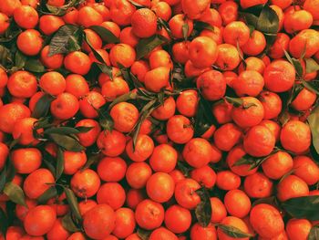 Full frame shot of oranges at market stall